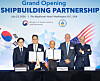 Korean Industry Minister Kim Jung-Kwan, far left, and U.S. Secretary of Commerce Howard Lutnick, far right, and officials from HD Hyundai Samho and HMM pose for a photograph in an event to celebrate opening of shipbuilding partnership between Seoul and Washington on July 23 in Washington D.C.