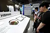 Visitors observe Samsung Electronics' high-bandwidth memory product, HBM4E, at an exhibition held in Gyeonggi on July 8.