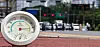 A thermometer shows a temperature above 40 degrees Celsius (104 degrees Fahrenheit) as heat shimmers rise from the road in the background in western Seoul on July 27.