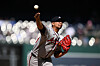 Then-Atlanta Braves reliever Carlos Carrasco throws during the ninth inning of a baseball game against the Washington Nationals, on April 23, in Washington.
