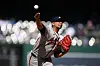 Then-Atlanta Braves reliever Carlos Carrasco throws during the ninth inning of a baseball game against the Washington Nationals, on April 23, in Washington.