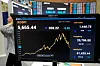 A monitor shows the Kospi at the Korea Exchange in western Seoul, on July 29.