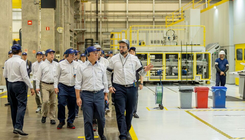 Hyundai Motor Group Executive Chair Euisun Chung, left in front row, inspects the automaker's factory in Sao Paulo in Brazil on July 27.