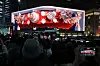 Christmas-themed content is displayed on a screen installed outside the Shinsegae Department Store in the Myeong-dong area in central Seoul on Dec. 24, 2025.