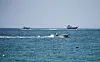 Vessels at the Strait of Hormuz are seen from Musandam, Oman, on July 26.