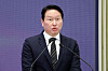SK Group Chairman Chey Tae-won speaks as he unveils investment plans at Blue House in central Seoul on June 29.