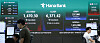 Hana Bank dealing room screens show KOSPI and market data after a steep opening decline in Seoul.