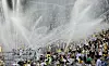 Water is sprayed to spectators' seating area during a KBO match between the Kiwoom Heroes and the LG Twins at Jamsil Baseball Stadium in southern Seoul on July 29.