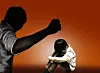 An image shows a father-like figure abusing a child