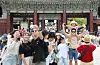 Domestic and foreign tourists are photographed inside the Gyeongbok Palace in Jongno District, central Seoul, on Aug. 9.