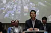 Seoul Mayor Oh Se-hoon, right in front row, watches a video clip during a town hall meeting about real estate policy held at City Hall in central Seoul on Aug. 6.