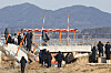 A concrete embankment beneath localizer structure is seen exposed on runway at Muan International Airport in South Jeolla on Jan. 20.