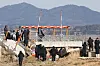 A concrete embankment beneath localizer structure is seen exposed on runway at Muan International Airport in South Jeolla on Jan. 20.