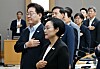 President Lee Jae Myung, second from front, salutes the national flag during a Cabinet meeting held at the Sejong Government Complex in the Chungcheong region on Aug. 11.