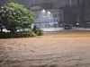 Road in Geoje, South Gyeongsang, is seen flooded due to heavy downpour on Aug. 17.