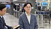 Industry Minister Kim Jung-kwan listens to reporters' questions after his arrival at Washington Dulles International Airport in Virgina on Aug. 16.