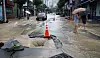 A road in Okpo-dong, Geoje, South Gyeongsang, is flooded and its asphalt surface is seen damaged by extreme rainfall on Aug. 17. (거제=뉴스1) 윤일지 기자 = 17일 경남 거제시 옥포동의 한 도로가 극한 호우로 침수돼 아수라장을 방불케하고 있다. 2026.8.17/뉴스1