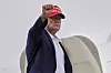 President Donald Trump gestures as he boards Air Force One at Morristown Airport, Sunday, Aug. 16, 2026, in Morristown, N.J. (AP Photo/Julia Demaree Nikhinson)/2026-08-17 07:26:55/