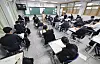 Students participate in a state-wide mock exam for the College Scholastic Ability Test (CSAT) held in a high school in Songpa District, southern Seoul, on June 4.
