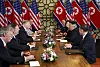 FILE - In this Feb. 28, 2019, file photo, U.S. President Donald Trump, third from left, speaks with National Security adviser John Bolton, left, and Secretary of State Mike Pompeo, second from left. during a meeting with North Korean leader Kim Jong Un, second from right, in Hanoi, Vietnam. Kim is cautiously turning up the heat after his unsuccessful summit with Trump in Hanoi two months ago. Though Kim claims he still has a good personal relationship with the U.S. president, he and senior North Korean officials have shown increasing frustration with Trump’s top advisers, Pompeo and Bolton. (AP Photo/ Evan Vucci, File)