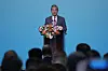 Chinese Foreign Minister Wang Yi speaks at the high-level meeting in Beijing, July 28.
