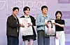 Four presenters pose with promotional posters for an SBS AI dating survival show at a Seoul press event.