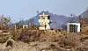 A North Korean military observation post is seen from South Korean border area in Paju, Gyeonggi, on Nov. 18, 2025.
