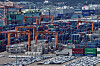 Containers for exports and imports are piled up at the Pyeongtaek Port in Gyeonggi on Aug. 11.