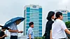 People walk in front of Hyundai Motor Group's headquarters in Seocho District, southern Seoul, on Aug. 21.