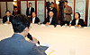 Kim Min-seok, the leader of ruling Democratic Party, bottom, speaks during the meeting between the government and the party held in central Seoul on Aug. 23.