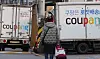 Coupang trucks are parked near the e-commerce platform's logistics center in Seoul on Dec. 29, 2025.