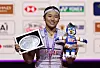 Badminton - BWF World Championships - Indira Gandhi Indoor Stadium, New Delhi, India - August 23, 2026 South Korea's An Se Young poses with her medal and trophy after winning the women's final against Japan's Akane Yamaguchi REUTERS/Bhawika Chhabra/2026-08-23 21:55:18/