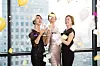 Three women without partners enjoy party by themselves in an undated photo.