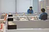 Nurses take care of newborn babies at a hospital in Gyeonggi on July 29.