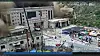 A CCTV footage shows people running away as wall of mud and water destroys buildings in a valley at Nepal-China border, in Gyirong, Tibet region, China on Aug. 26.