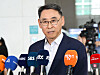 Doosan Enerbility Vice Chairman Jung Yeon-in talks to press while he enters Incheon International Airport to leave for Nepal for emergency assistance on Aug. 27.