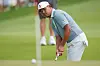 Si Woo Kim, of South Korea, watches his putt on the fifth green during the third round of the PGA Tour Championship golf tournament, Saturday, Aug 29, 2026, in Atlanta.(AP Photo/Mike Stewart)/2026-08-30 06:10:02/