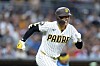 San Diego Padres' Sung-Mun Song runs to first on a sacrifice bunt before being called out in the third inning of a baseball game against the Milwaukee Brewers Monday, Aug. 10, 2026, in San Diego. (AP Photo/Karl Anderson)