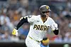 San Diego Padres' Sung-Mun Song runs to first on a sacrifice bunt before being called out in the third inning of a baseball game against the Milwaukee Brewers Monday, Aug. 10, 2026, in San Diego. (AP Photo/Karl Anderson)
