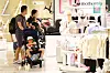 A family with children is seen at a department store's children's store in Seoul on Aug. 26.