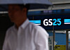 A person walks in front of GS25 store in Seoul on Aug. 31.