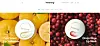 Two round lip-care products among citrus fruit and red berries in a split-screen display.