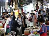 Consumers shop food products at a traditional market in Dongdaemun District, eastern Seoul, on Sept. 1.