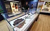 Visitors observe relics discovered inside the 1,600-year-old Baekje-era reservoir at an exhibition hall at the Jungwon National Research Institute of Cultural Heritage in Chungju, North Chungcheong, on Sept. 1.