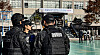 Officers from special police force inspect a school in Daegu after a bomb threat report was received on Nov. 10, 2025.