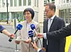 Attorneys from Daeryun Law Firm speak to reporters in front of the United States District Court for the Eastern District of New York on Sept. 1.