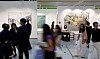Visitors walk among contemporary artworks and gallery booths at Frieze Seoul in Seoul.