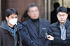 Director of Saekdongwon, a residential facility for people with developmental disabilities in Ganghwa, Incheon, center, is seen at Seoul Central District Court in Seocho District, southern Seoul, on Feb. 19.