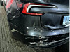A damaged Tesla Model Y that spent several weeks waiting to be admitted for repairs is seen in a photo provided by the source.