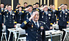 Kim Jong-chul, acting commissioner general of the National Police Agency, center, makes a salute during a leadership meeting held in western Seoul on Sept. 3.